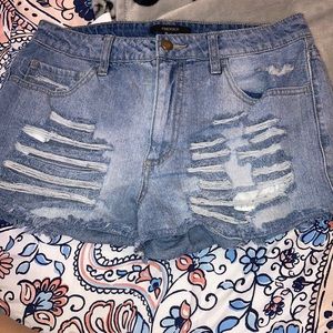 Blue ripped jean shorts